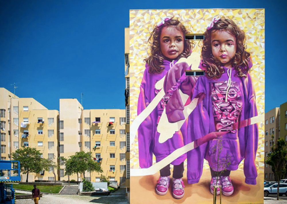 Mural in Bairro Padre Cruz, Lisbon, Portugal.