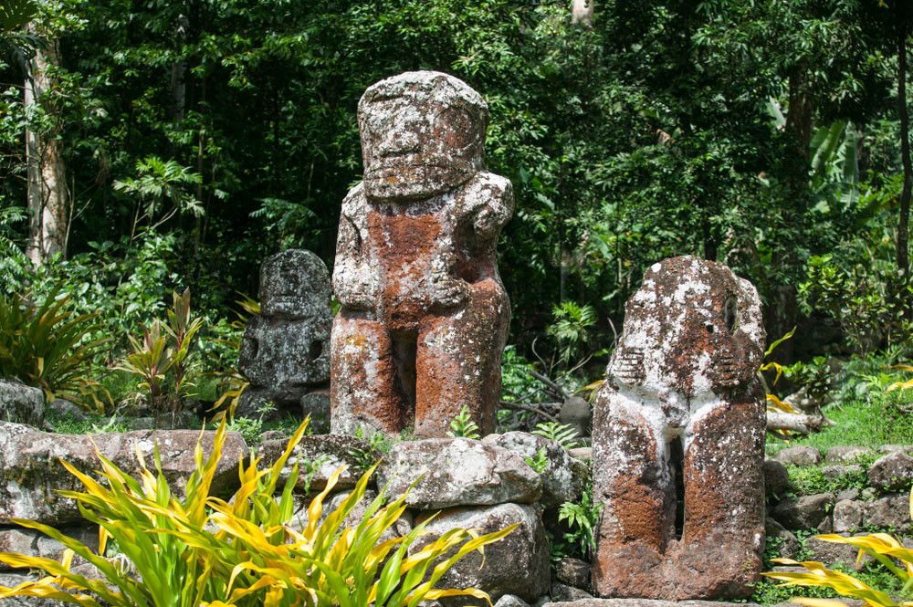 Tikis on Hiva Oa Island, Marquesas Islands, French Polynesia.
